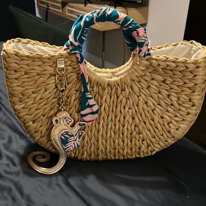 Lilly Pulitzer straw bag with silk wrapped handles & matching charm